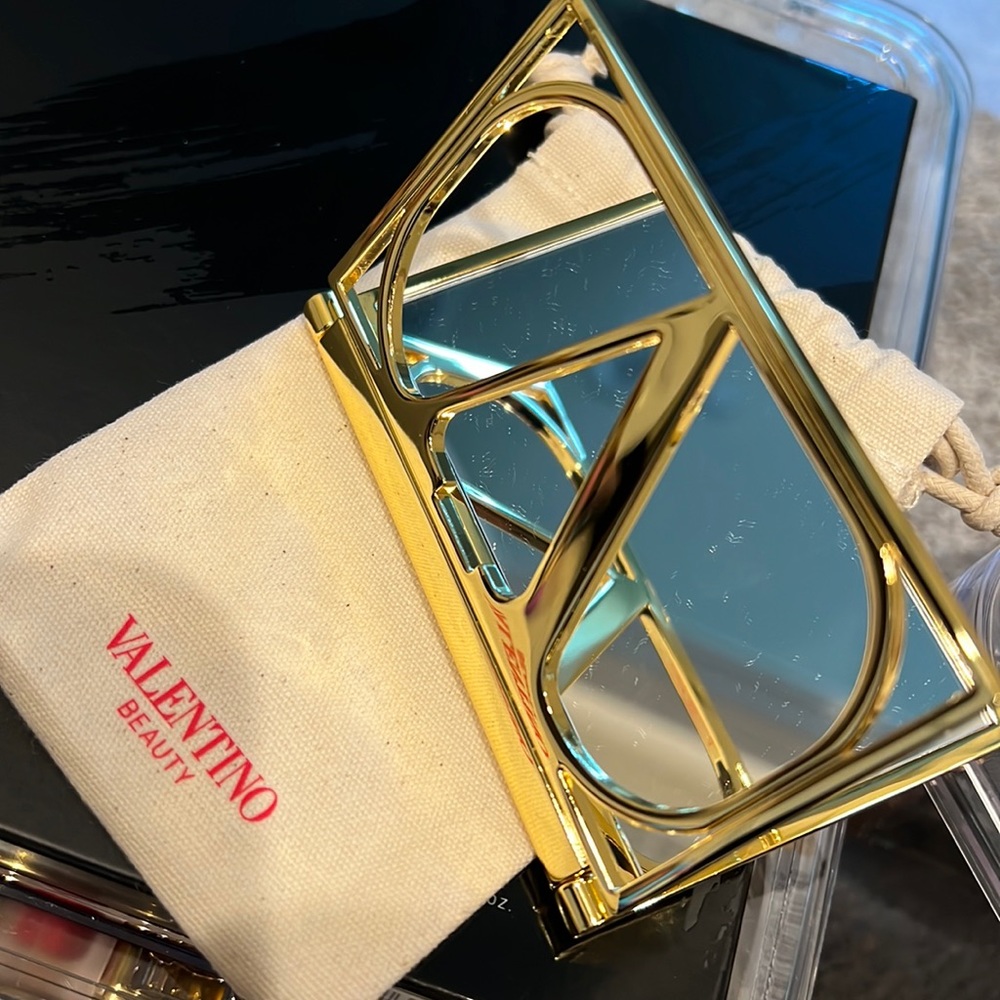 Gold Valentino mini mirror with pouch